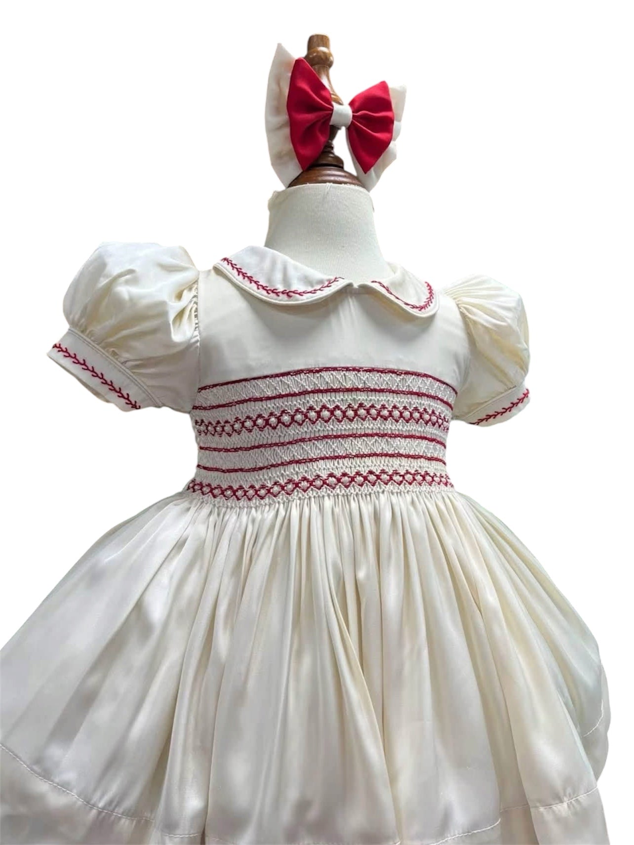 Ivory and red dress with pearl smock detail