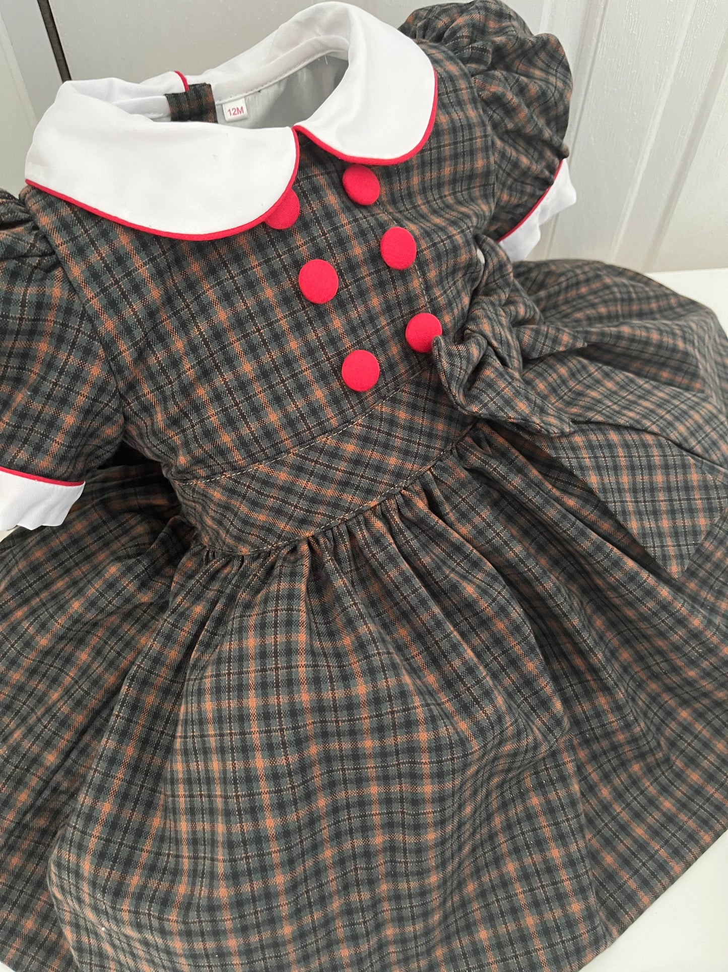 Green and brown tartan dress