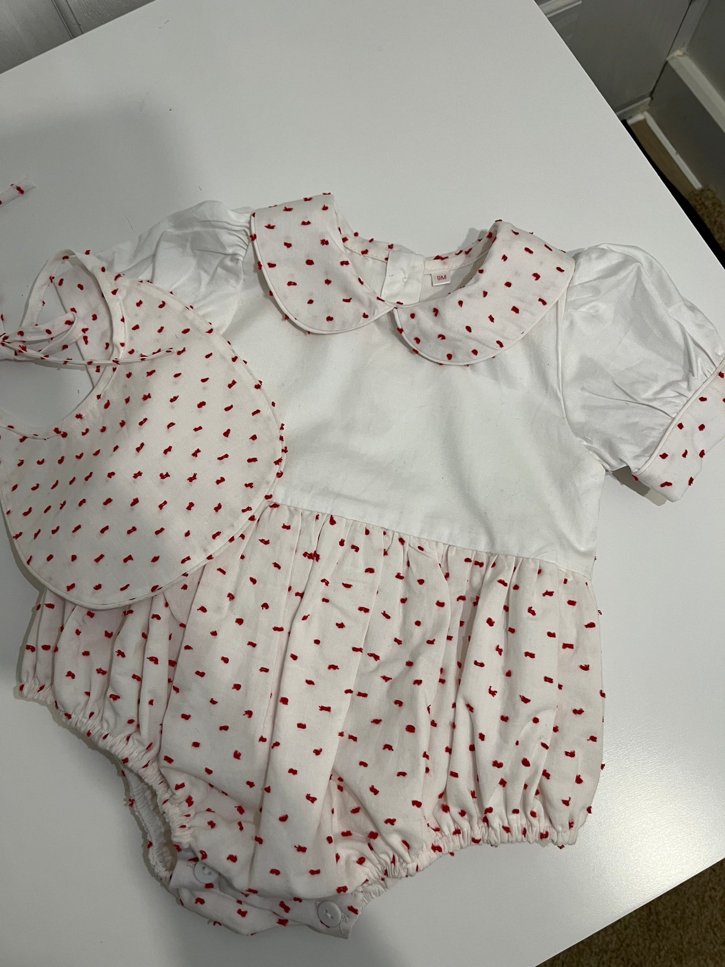Red plumetti romper and bib set